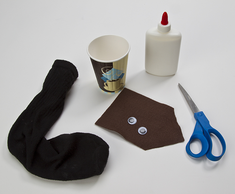 Materials: sock, paper cup, felt, googly eyes, glue, scissors