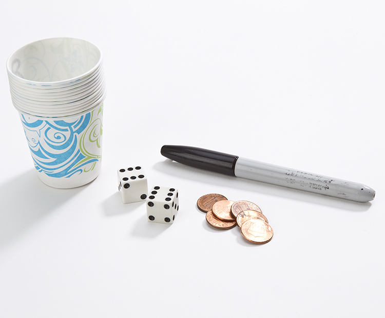 Materials: paper cups, black marker, dice, pennies