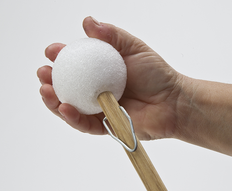 Pressing foam ball onto duster