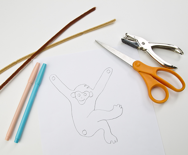 Materials: printed monkeys, chenille stamps, scissors, hole punch, markers