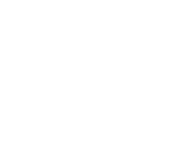 Flamingo next to fridge.