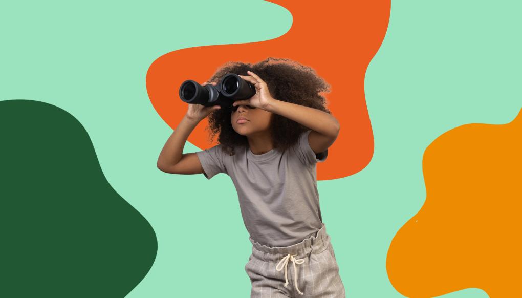 Girl looking trhough binoculars